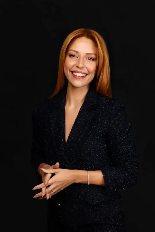 Portrait of event host and Master of Ceremony Elif Tümen